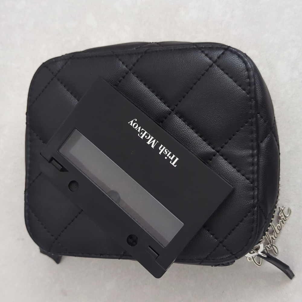 Trish McEvoy small makeup planner with page